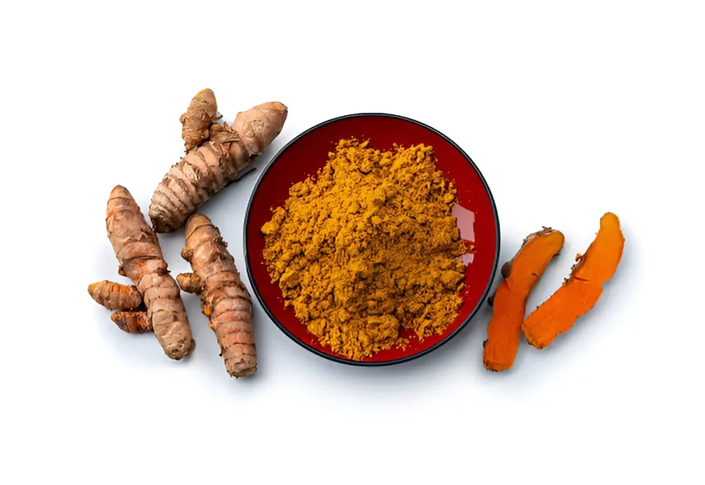 Applying turmeric paste to gums for tooth pain relief