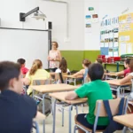 Students attending a classroom lesson — representing how many days in a school year students spend in school